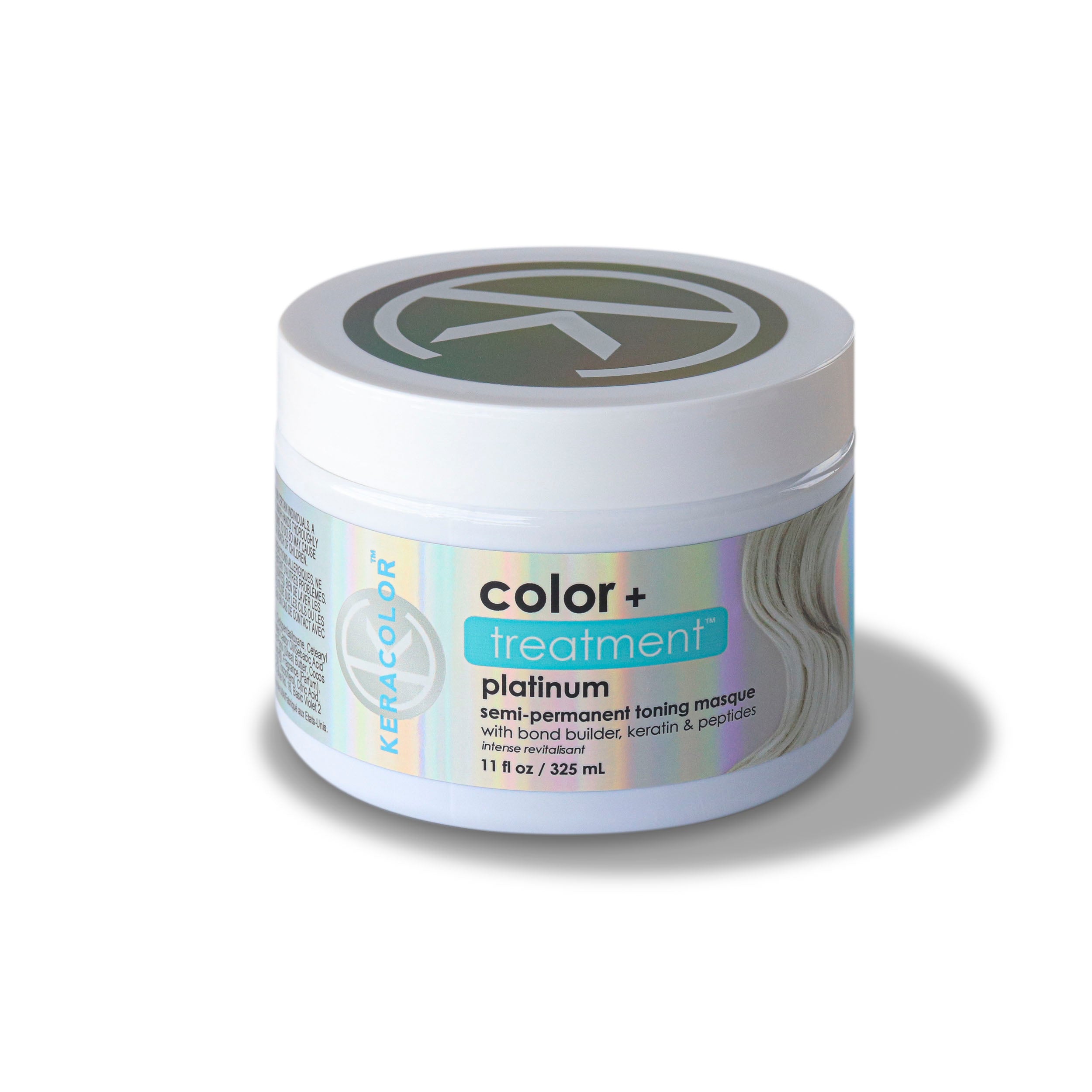 A container of platinum treatment masque for toning your hair with keratin and peptides on a white background