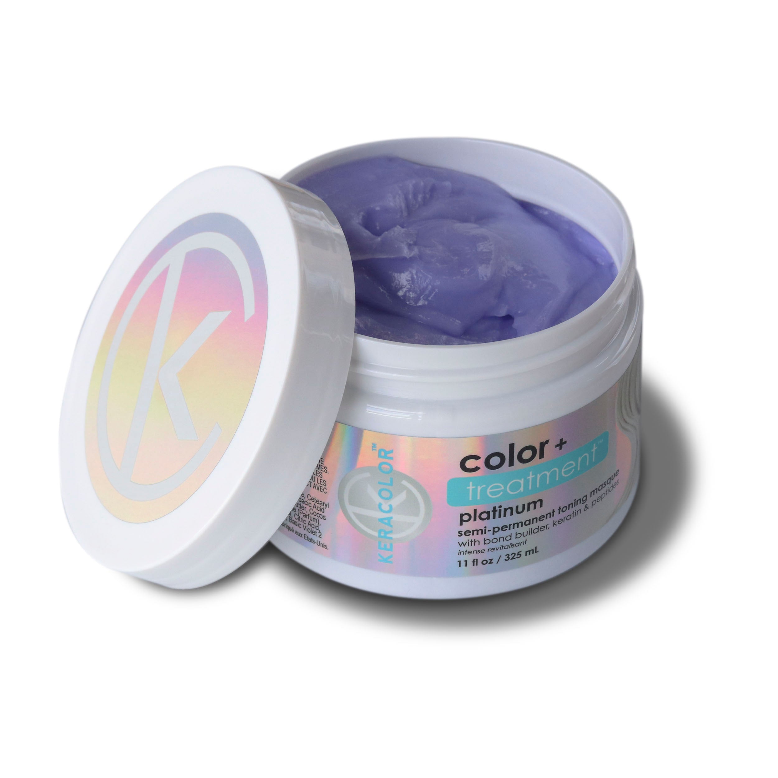An open container of platinum treatment masque for toning your hair with keratin and peptides on a white background