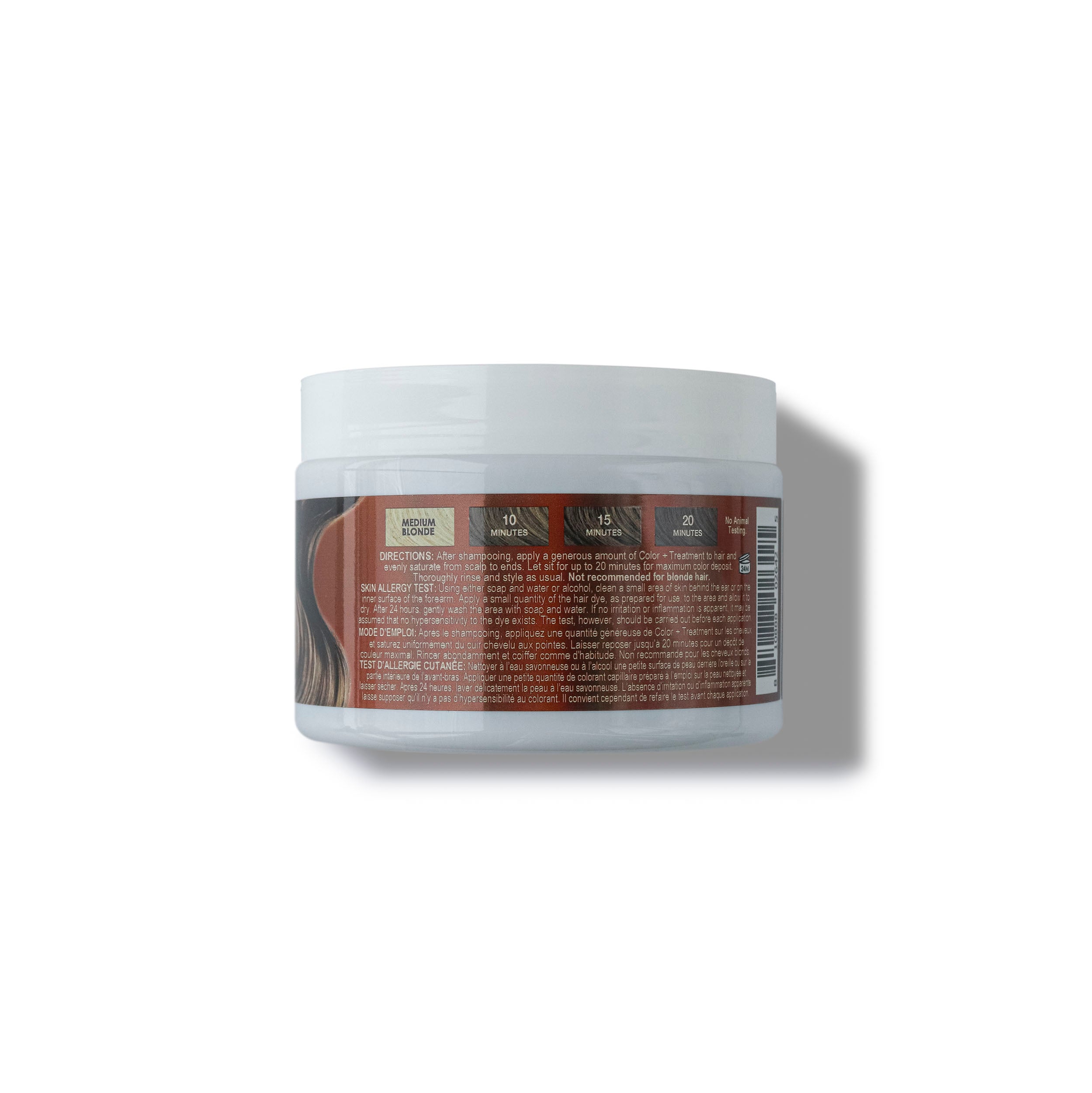The back of the jar of mocha treatment masque for toning your hair with keratin and peptides on a white background
