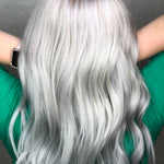 A candid image of a women with bleached hair treated with Violet toning drops